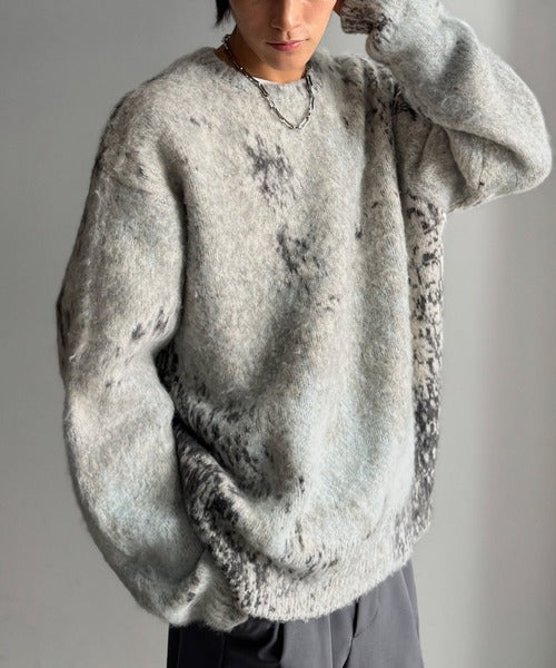 JaVaジャバコラボ》視線を釘付け。アブストラクト柄ニットプル