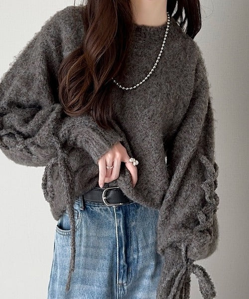 大人の華やかニット。袖レースアップキャンディスリーブニット