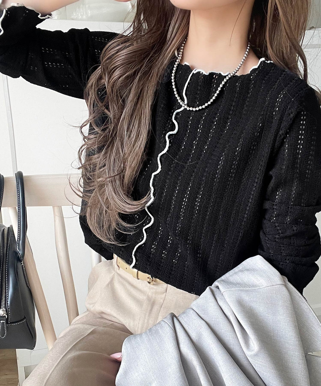 ほんのり色っぽ。透かし編みセンターメロウフレアスリーブトップス